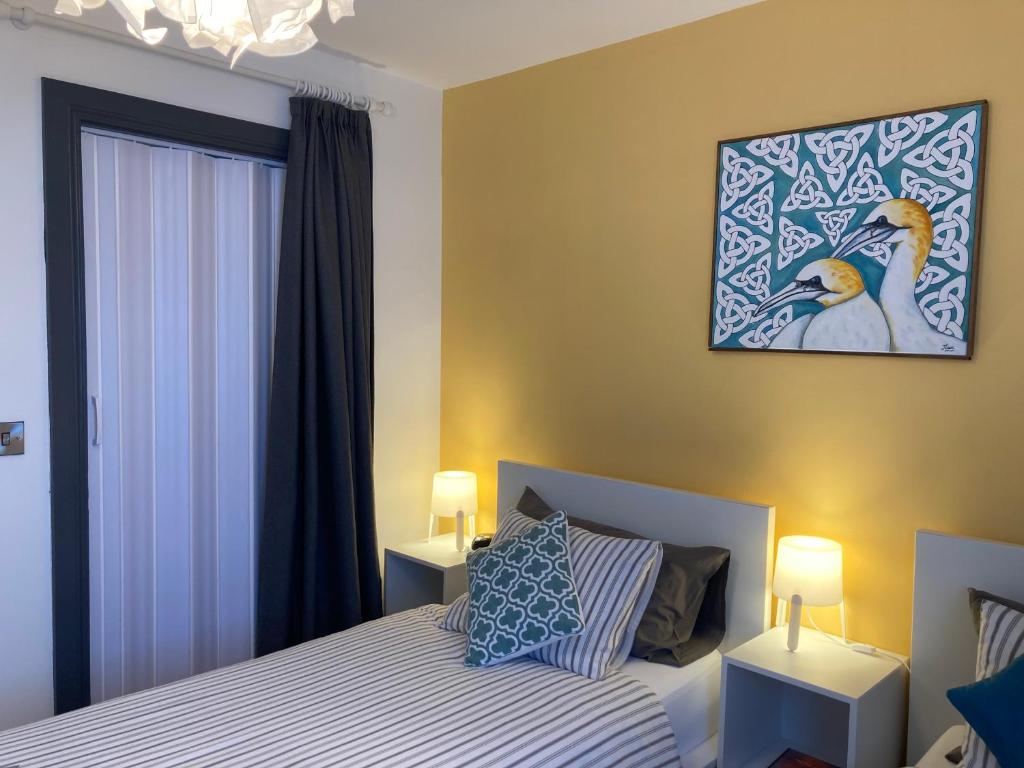 Letto o letti in una camera di Uisce Beatha House B&B
