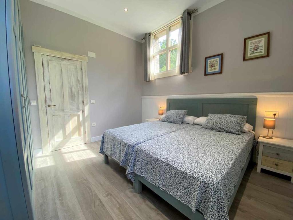 Postel nebo postele na pokoji v ubytování Casa de Los Carpinteros