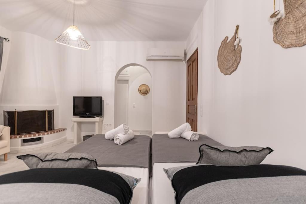 Posteľ alebo postele v izbe v ubytovaní VILLA HARMONIA I