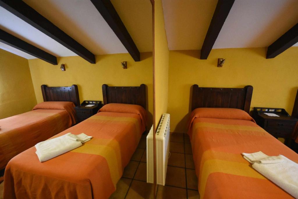 Posteľ alebo postele v izbe v ubytovaní Casa rural de estilo rustico con SPA