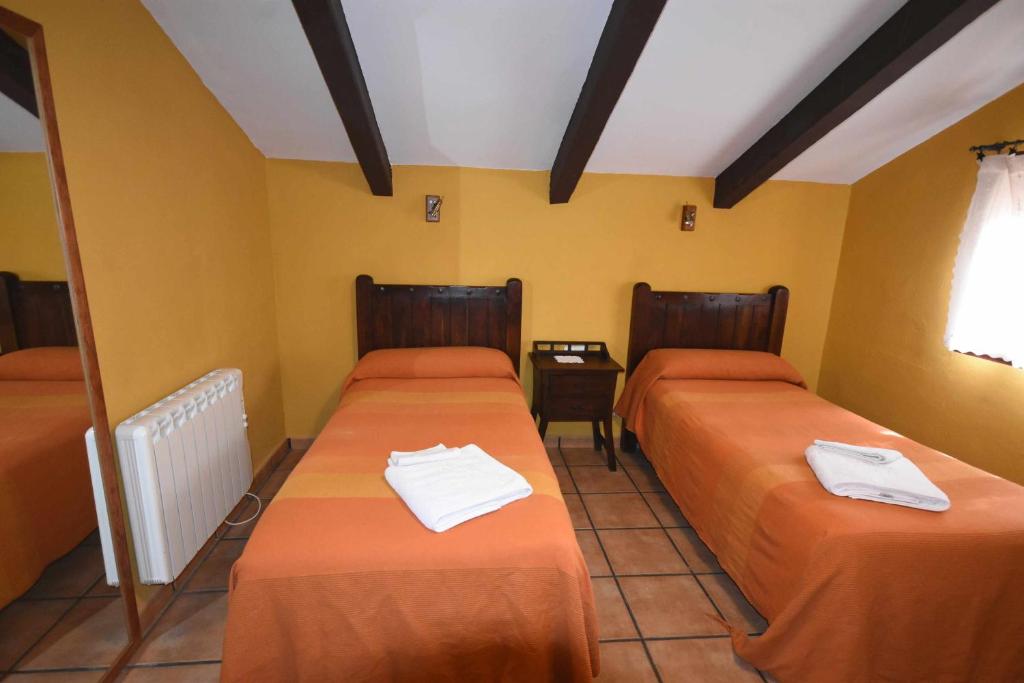 Posteľ alebo postele v izbe v ubytovaní Casa rural de estilo rustico con SPA