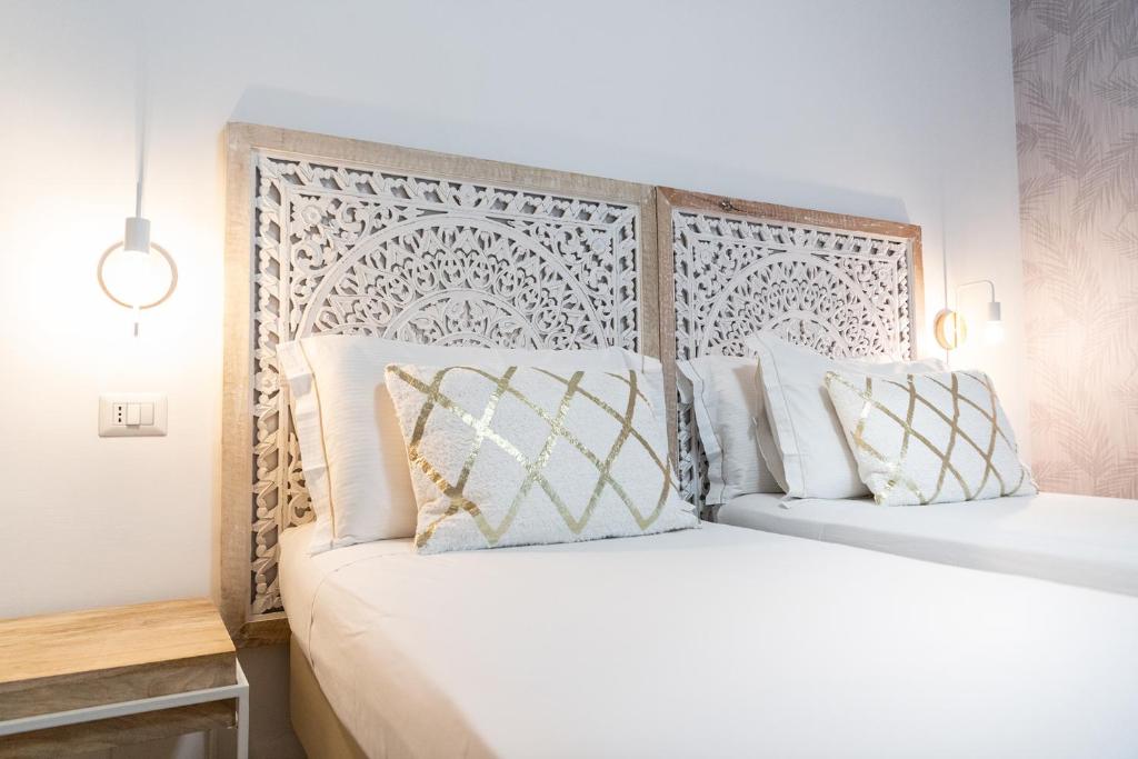 Postel nebo postele na pokoji v ubytování Hotel Brennero