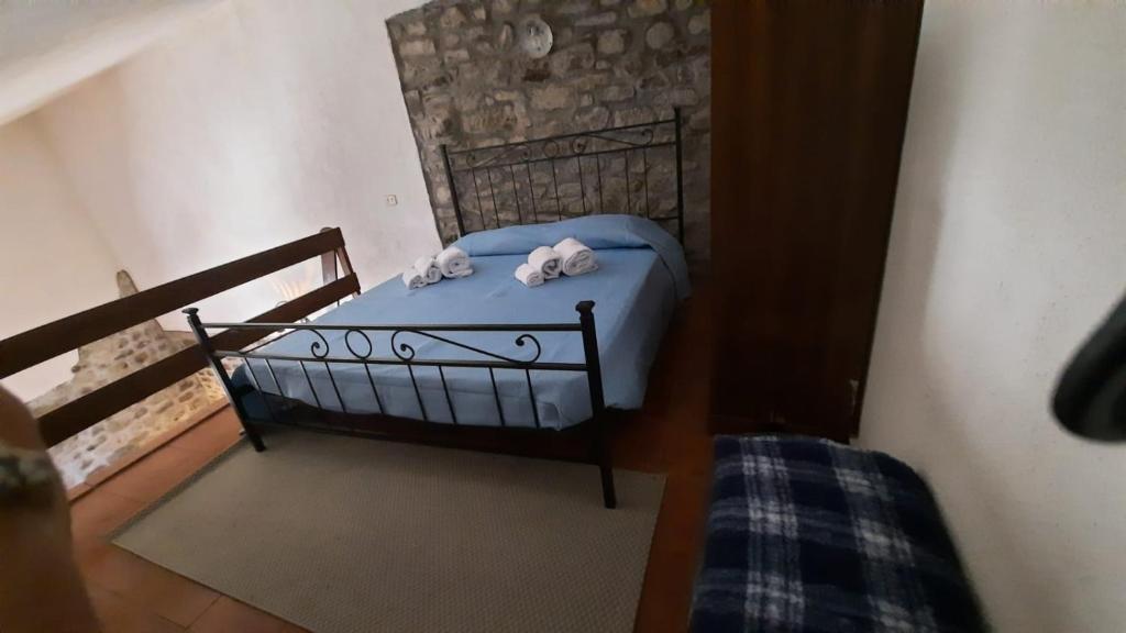 Postel nebo postele na pokoji v ubytování La Casetta