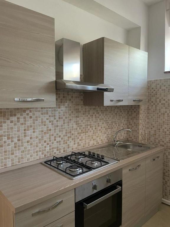 Kuchyň nebo kuchyňský kout v ubytování B&B Il Dolce Nido
