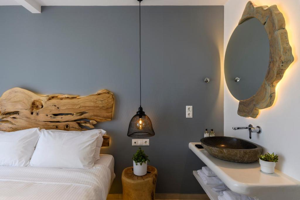 Postel nebo postele na pokoji v ubytování Casa Anna Suites