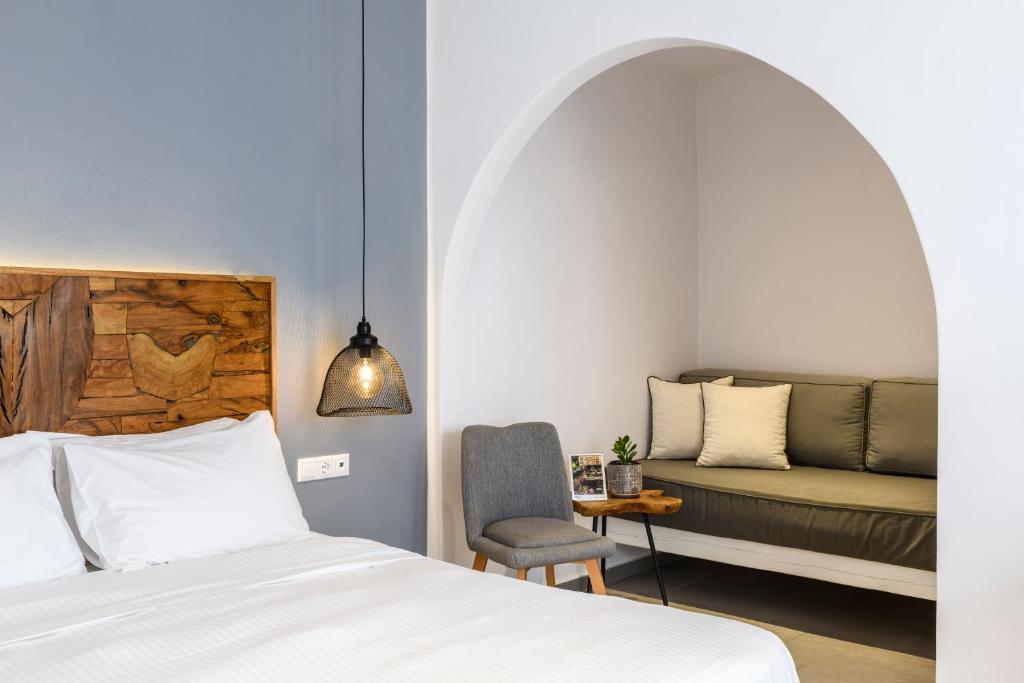 Postel nebo postele na pokoji v ubytování Casa Anna Suites