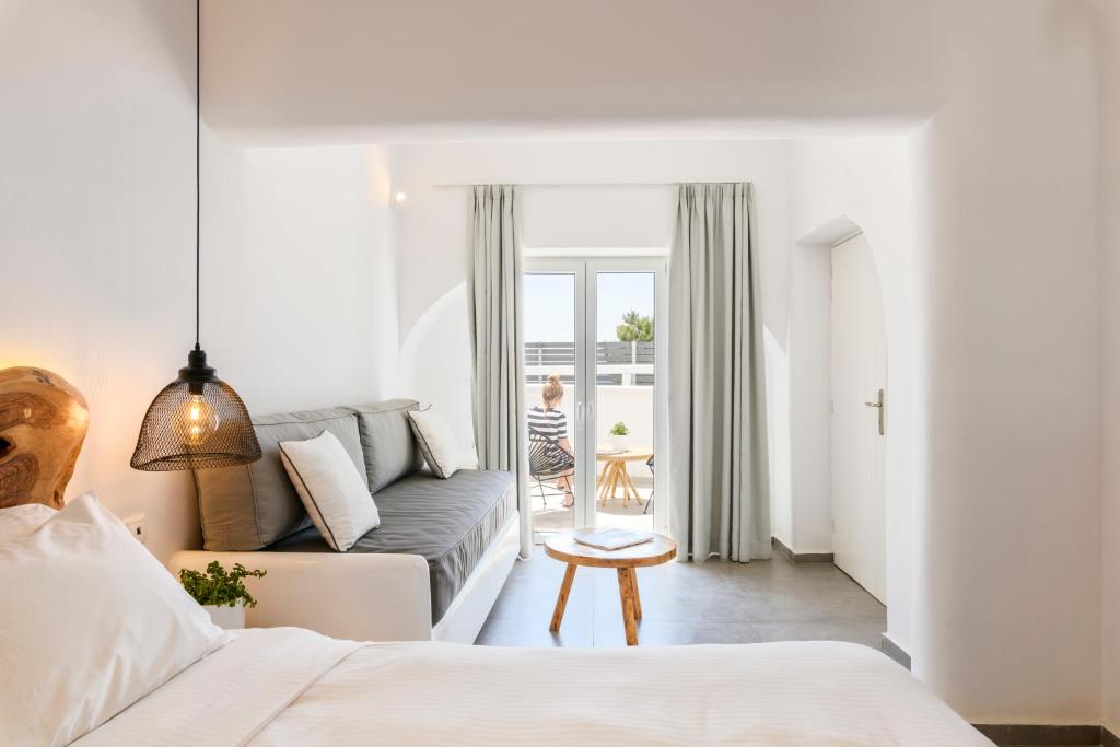 Postel nebo postele na pokoji v ubytování Casa Anna Suites