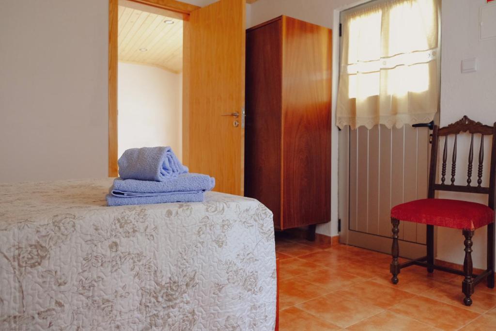 Postel nebo postele na pokoji v ubytování Casinha da Eira