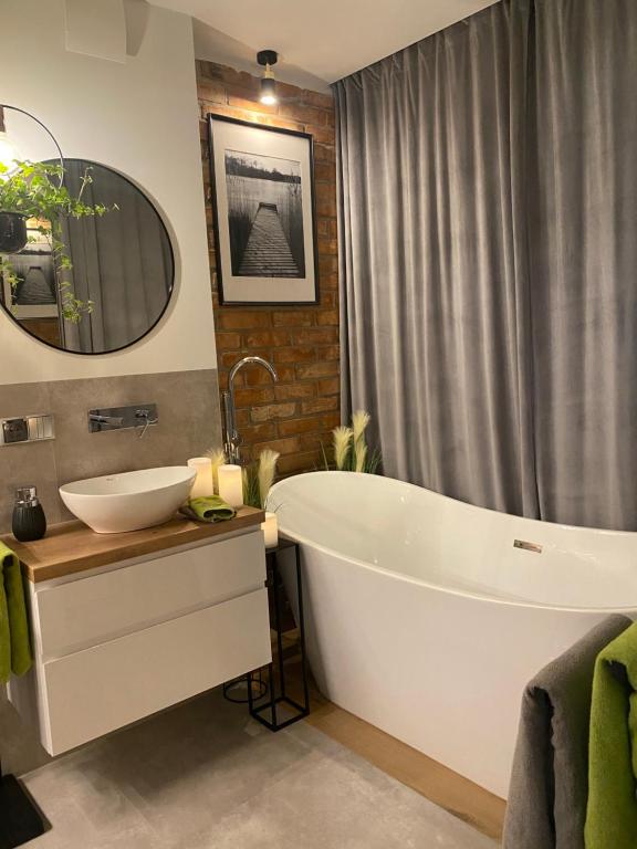 Kúpeľňa v ubytovaní Apartament MoLoo III