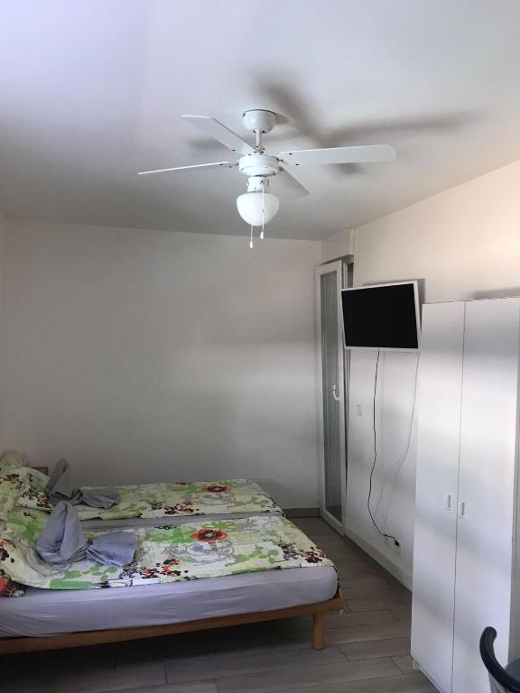 Postel nebo postele na pokoji v ubytování Bellinzona Rooms