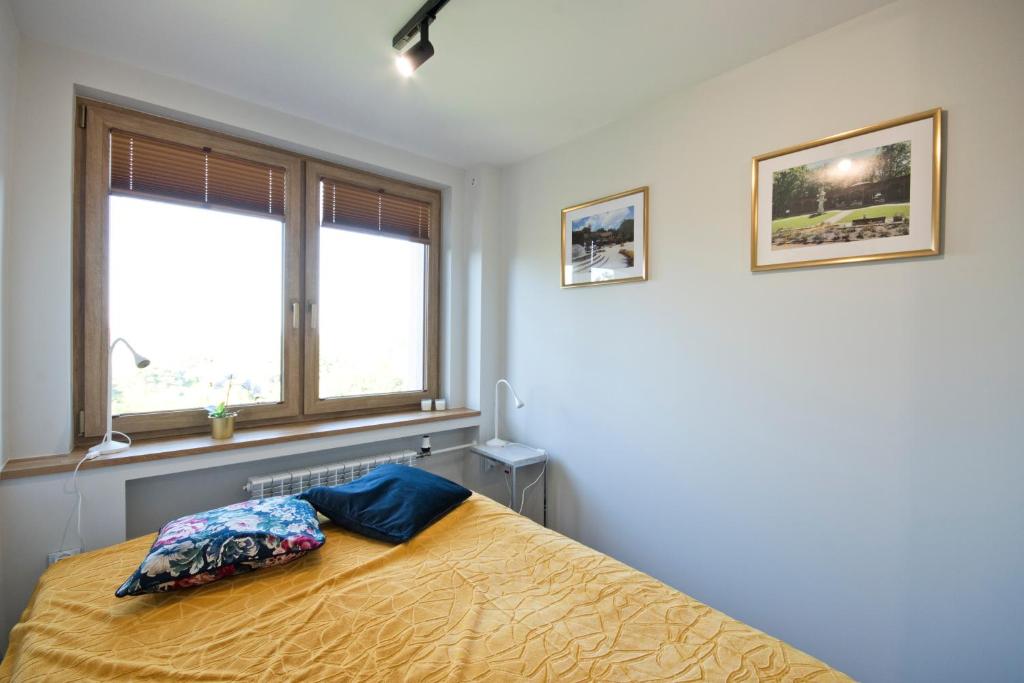 Posteľ alebo postele v izbe v ubytovaní Apartament Jastrzębie