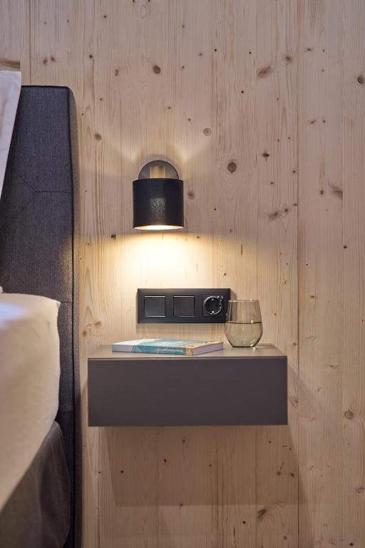 Postel nebo postele na pokoji v ubytování Black Forest Lodges - gehobene Ferienwohnungen mit Privatsaunas
