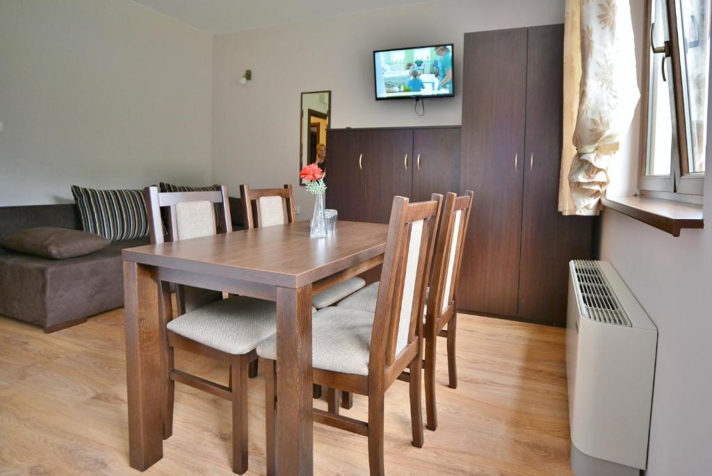 Televízia a/alebo spoločenská miestnosť v ubytovaní Villa Asturia