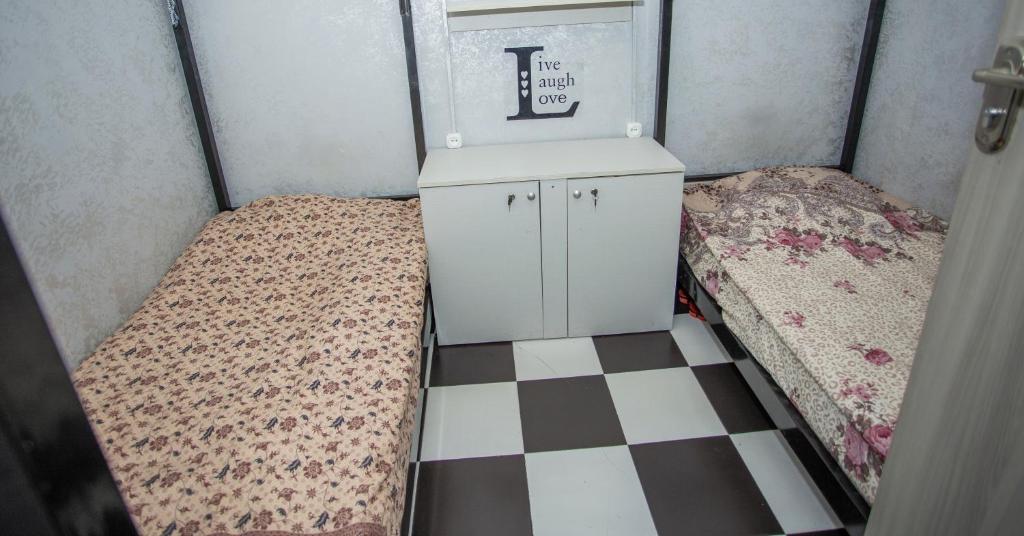 Postel nebo postele na pokoji v ubytování Hostel California