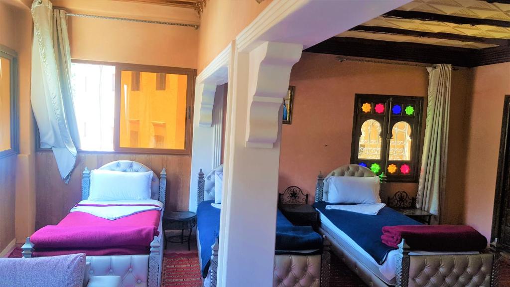 Postel nebo postele na pokoji v ubytování Hôtel Restaurant Les Etoiles Du Toubkal