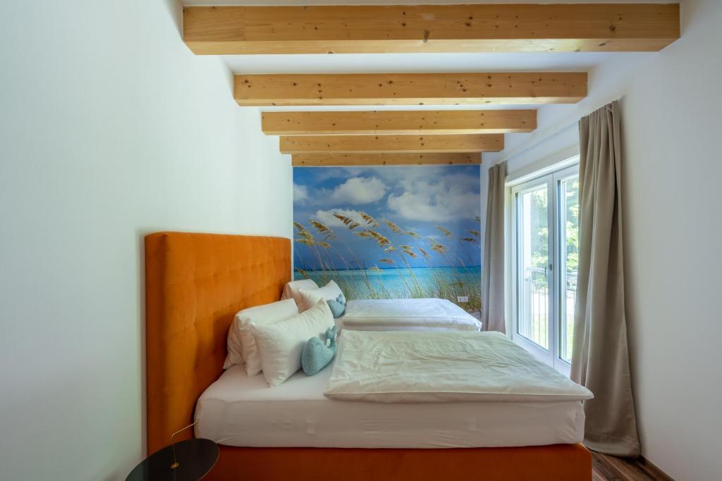Postel nebo postele na pokoji v ubytování Ferienhaus Melita