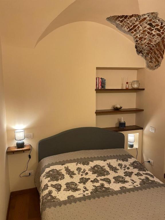 Posteľ alebo postele v izbe v ubytovaní Il Nido Del Borgo