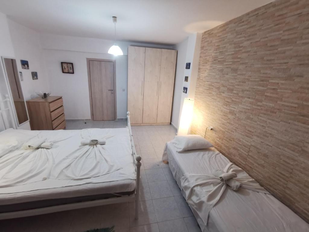 Posteľ alebo postele v izbe v ubytovaní Orange_Blue_Aparment №1