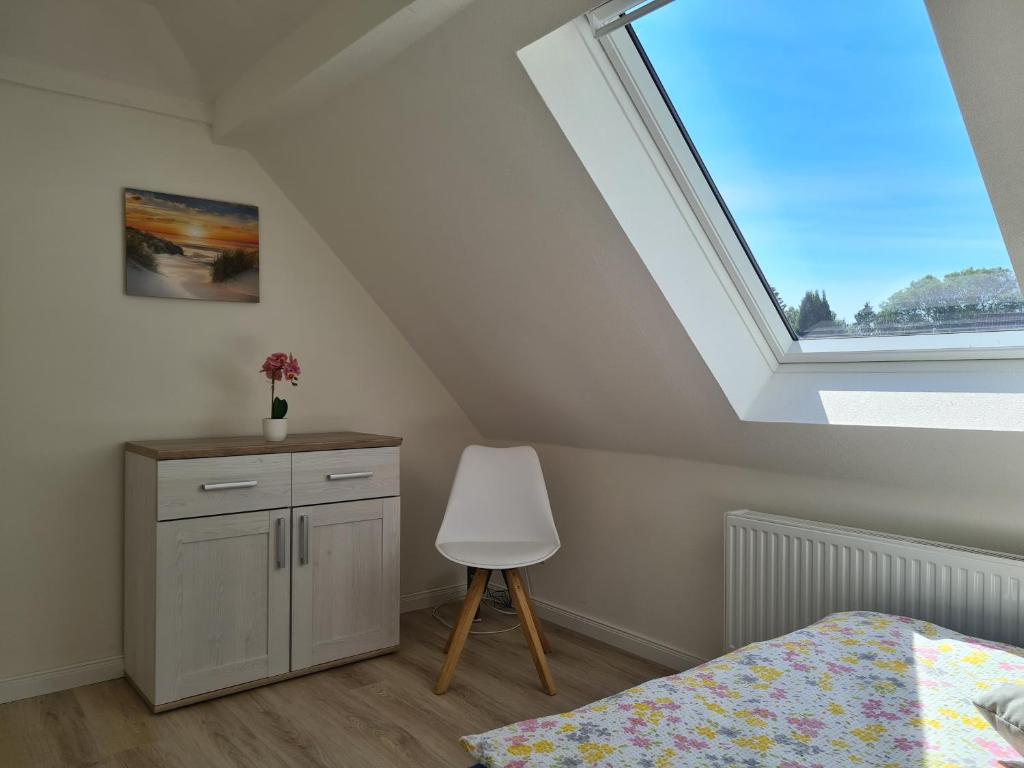 Postel nebo postele na pokoji v ubytování Leuchtturm Emden