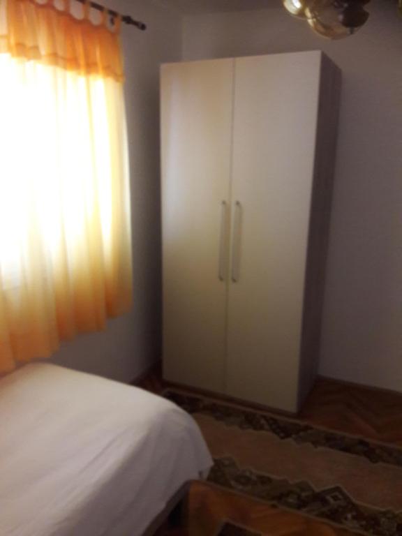 Postel nebo postele na pokoji v ubytování Apartment Bise