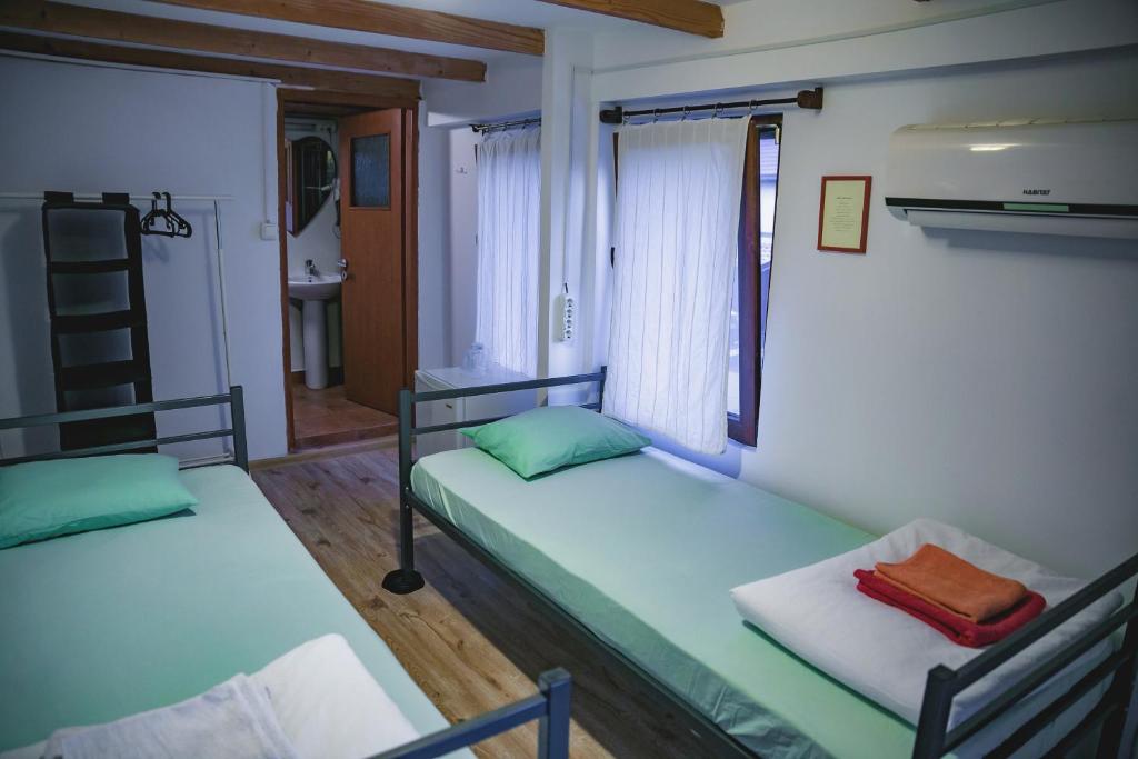 Postel nebo postele na pokoji v ubytování Bazart Vama Veche