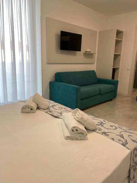 TV a/nebo společenská místnost v ubytování Hotel Bahia