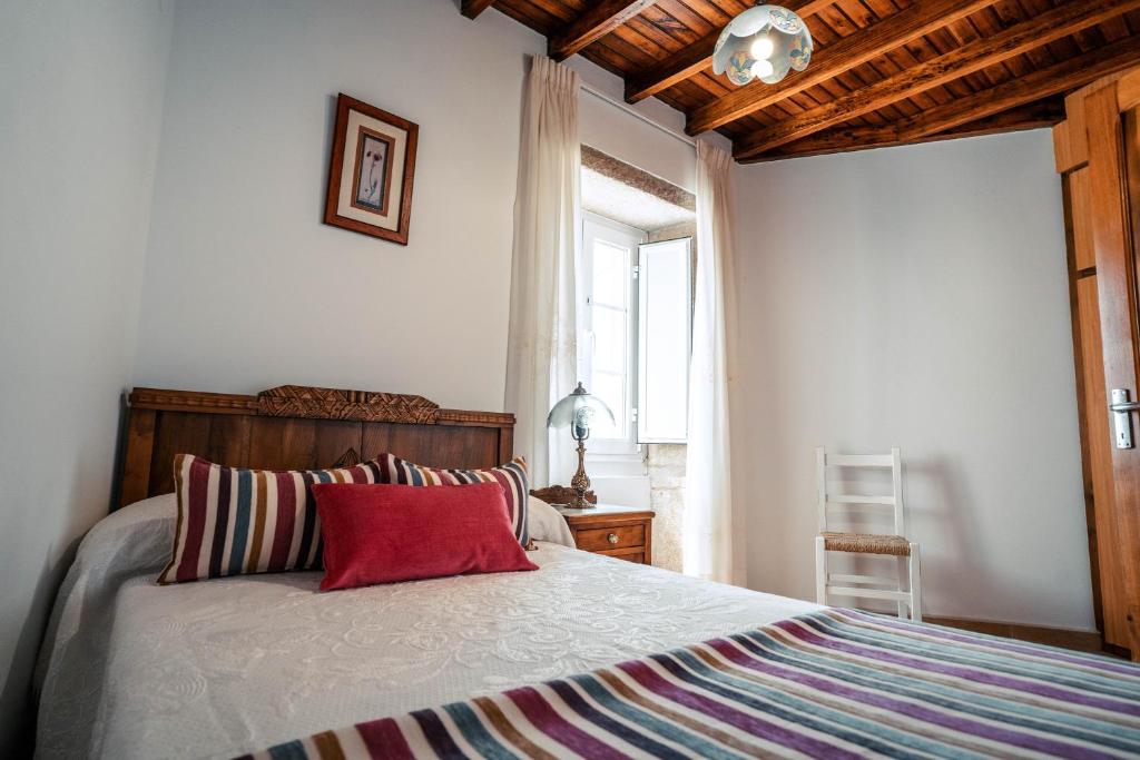 Posteľ alebo postele v izbe v ubytovaní Casa en Muros con preciosas vistas al mar
