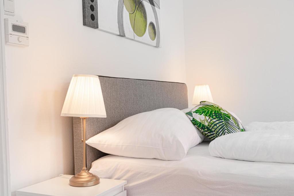 Posteľ alebo postele v izbe v ubytovaní Pleasing 2BR Apt. AKH-Perfect for Groups