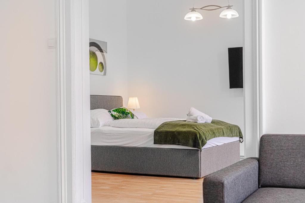 Posteľ alebo postele v izbe v ubytovaní Pleasing 2BR Apt. AKH-Perfect for Groups