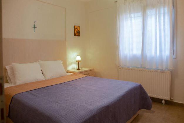 Posteľ alebo postele v izbe v ubytovaní Nikogroup By the Sea 3