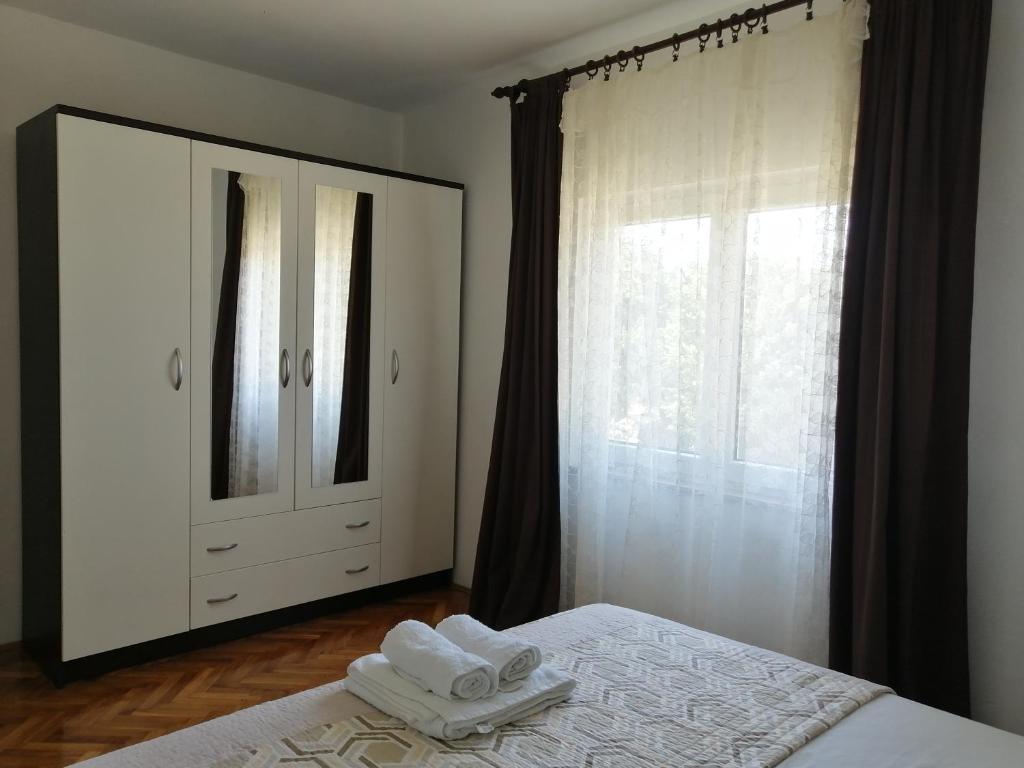 Postel nebo postele na pokoji v ubytování Holiday house Tunjarice