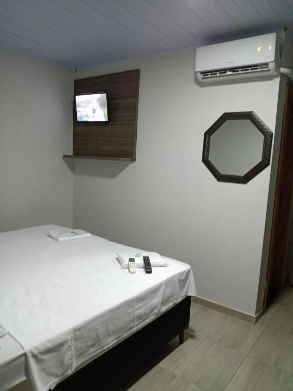 Postel nebo postele na pokoji v ubytování Hotel ROF