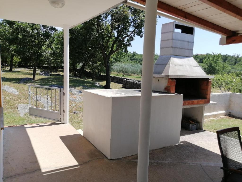 Balkón nebo terasa v ubytování Holiday house Tunjarice