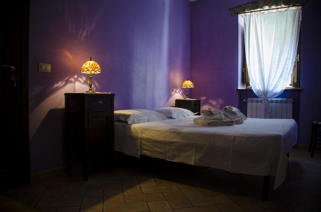 Postel nebo postele na pokoji v ubytování Bed and breakfast La Sentinella