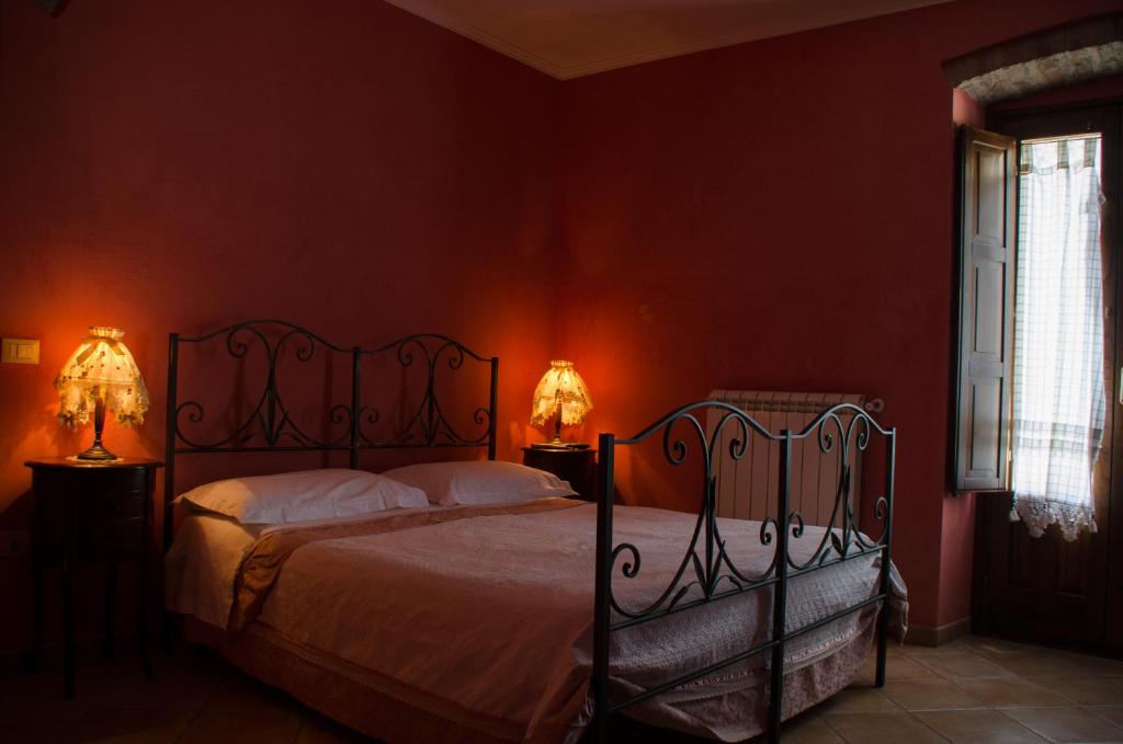 Postel nebo postele na pokoji v ubytování Bed and breakfast La Sentinella
