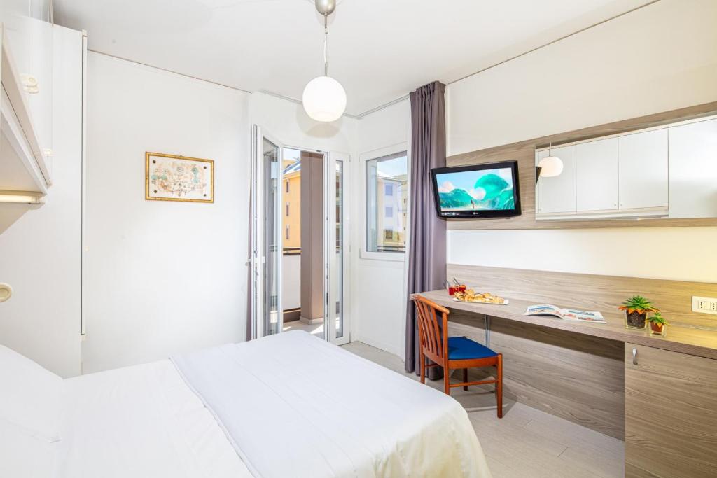 Postel nebo postele na pokoji v ubytování Hotel Alexander