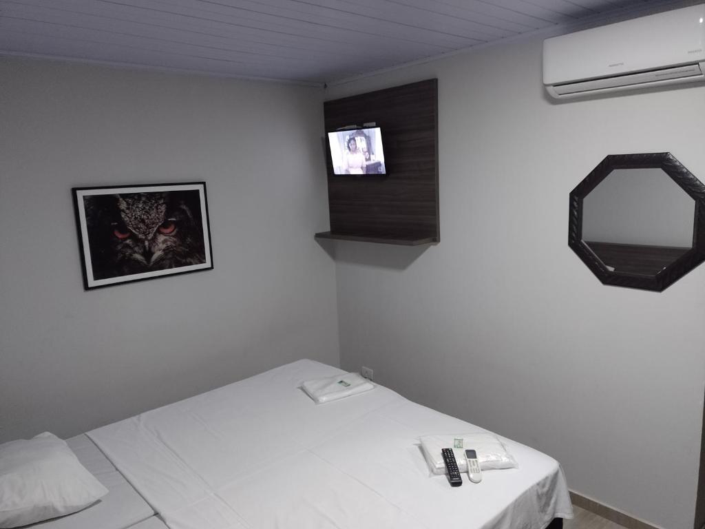 Postel nebo postele na pokoji v ubytování Hotel ROF