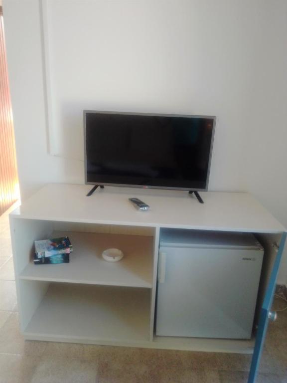 TV a/nebo společenská místnost v ubytování Hotel Narkissos