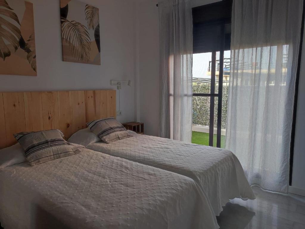Postel nebo postele na pokoji v ubytování Apartment in Ayamonte with River Views