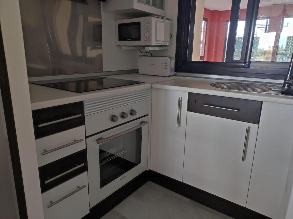 Kuchyň nebo kuchyňský kout v ubytování Apartment in Ayamonte with River Views