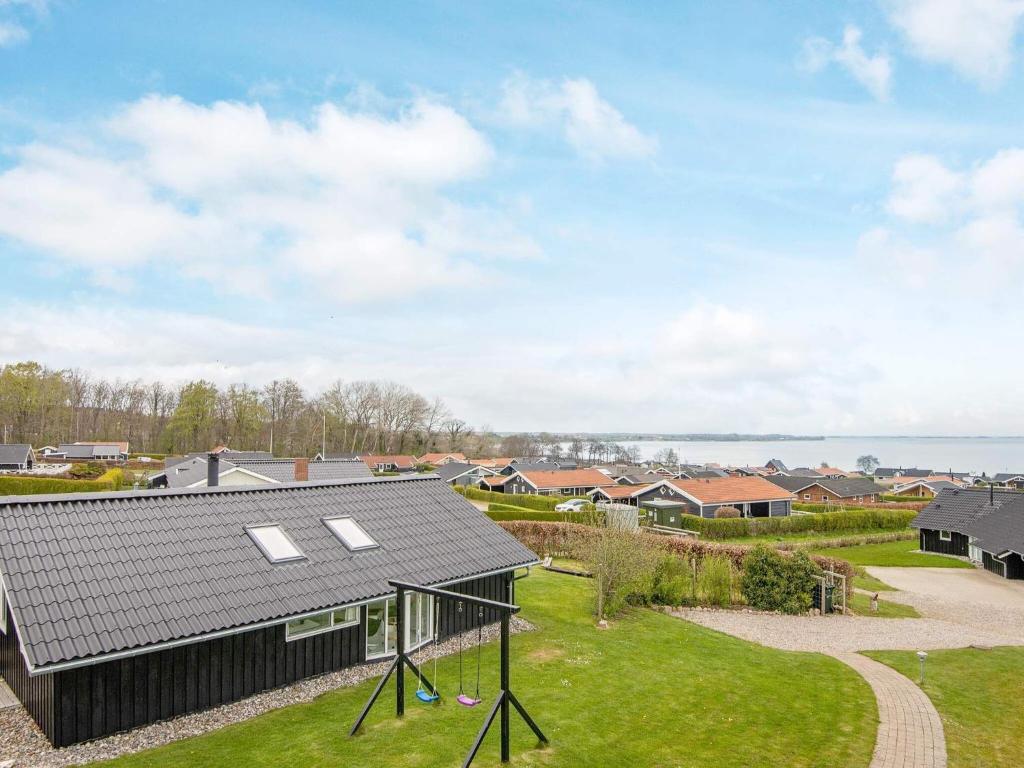an aerial view of a house with a roof at 6 person holiday home in Sj lund in Sjølund