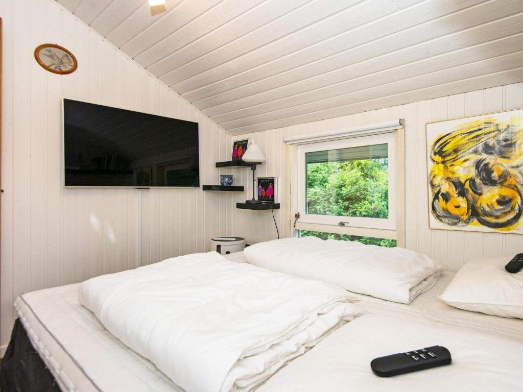 Postel nebo postele na pokoji v ubytování Holiday home Brovst X