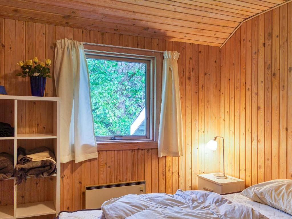 Postel nebo postele na pokoji v ubytování 10 person holiday home in Dannemare-By Traum