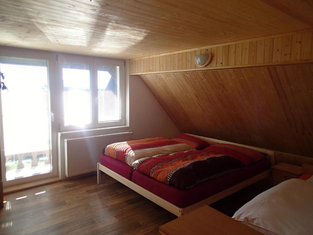 Postel nebo postele na pokoji v ubytování Chata Venda