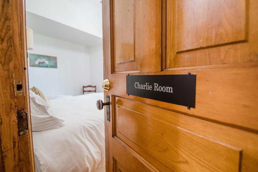 a door with a sign that reads cardiac room at Charlie Room BW Boutique Hotel in Central Lake