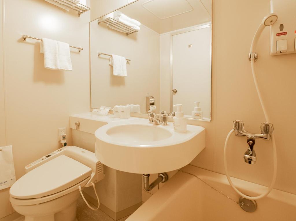 Koupelna v ubytování Tabist Hotel Colosseum Inn Tateshina
