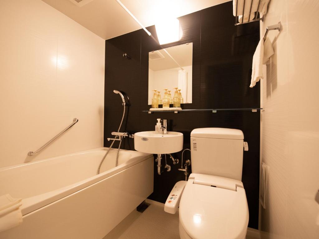 Koupelna v ubytování Tabist Hotel Colosseum Inn Tateshina