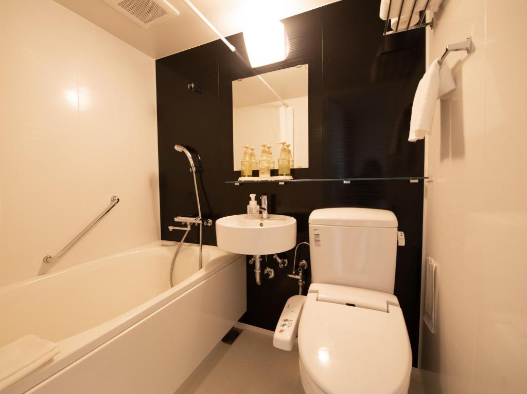 Koupelna v ubytování Tabist Hotel Colosseum Inn Tateshina