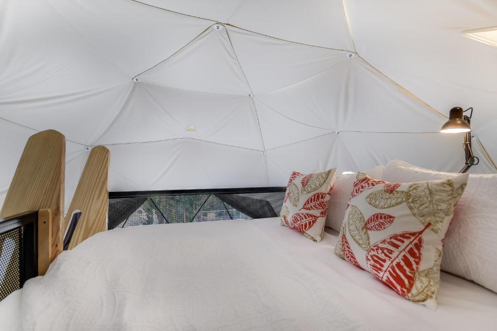 Postel nebo postele na pokoji v ubytování Udoscape Eco-Glamping Resorts