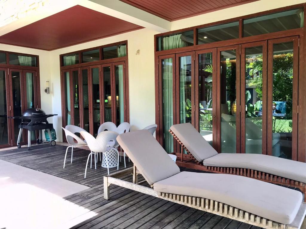 Fotografie z fotogalerie ubytování Amatapura Beachfront Villa 10 , SHA Certified v destinaci Ao Nam Mao